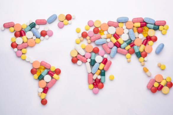 Mapy of the world made from pills of various sizes, shapes and colours