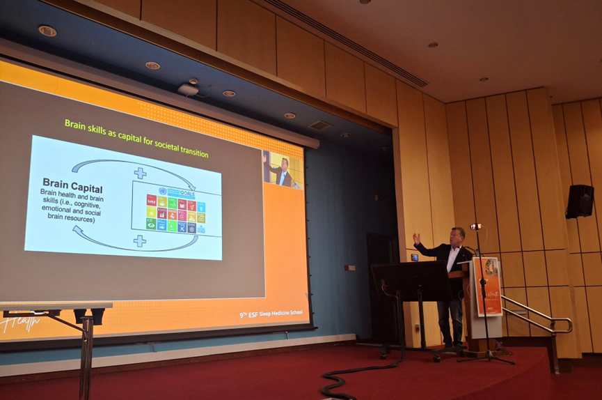 Former EAN President, Prof. Claudio Bassetti delivering a lecture on stage