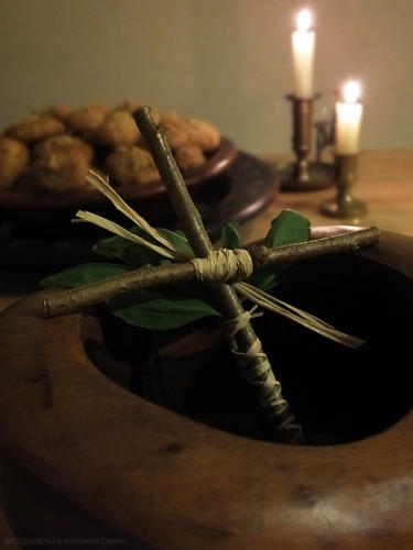 While Christmas trees are common in Greece, a more traditional decoration is a small wooden bowl with a piece of wire suspended across it. A spring of basil is wrapped around a wooden cross and hangs from the wire. There is fresh water in the bowl to keep the basil alive. Once per day, a family Member dips the cross and basil into some holy water and sprinkles every room to keep the bad spirits, kallikantzaroi, away. 