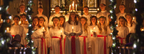 One of the biggest celebration around Christmas in Sweden is St. Lucia’s Day on the 13th of December. St. Lucia was a young Christian girl who was killed for her faith in 304. She was said to have secretly brought food to the prosecuted Christians in Rome, who were hiding in the catacombs. She wore candles on her head to have both her hands free to carry things. Her name translates to ‘light’. In the old Julian Calendar, December 13th also marks the winter solstice. The pagan festival of lights was turned into St. Lucia’s day when Christianity was brought to Sweden.